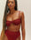 TOP MIA CON RIBETES EN COLOR BURDEOS