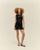 ROBE MINI ASYMÉTRIQUE EN MAILLE NOIRE